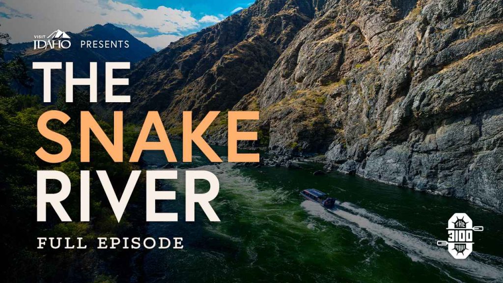 Text reads, ‘Visit Idaho Presents The Snake River, Full Episode,’ over an image of a jet boat racing into rugged, rushing waters.